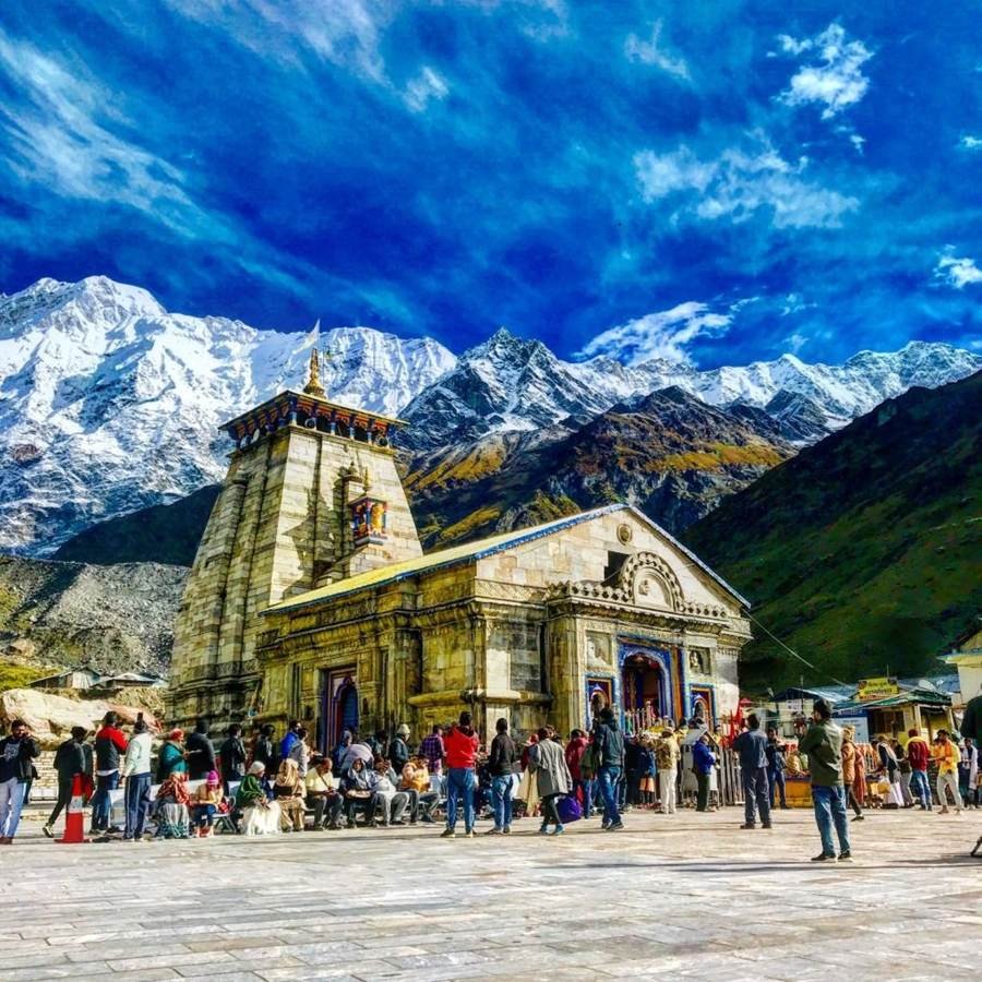 Kedarnath Temple with snow-covered peaks behind it